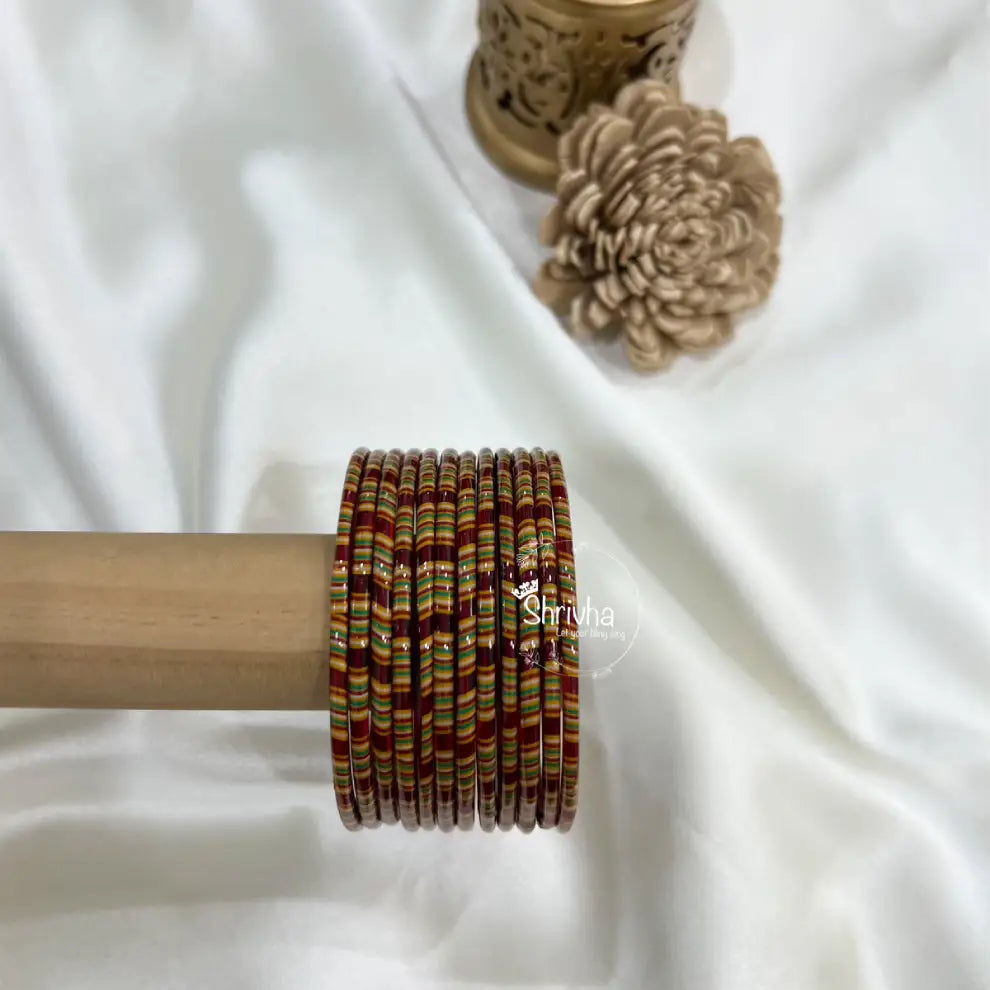 Traditional handcrafted glass bangles shining under festive lights