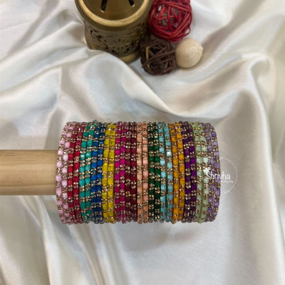Arctic Luminescence – Glass Bangles with Stone Inlays (28Pc)